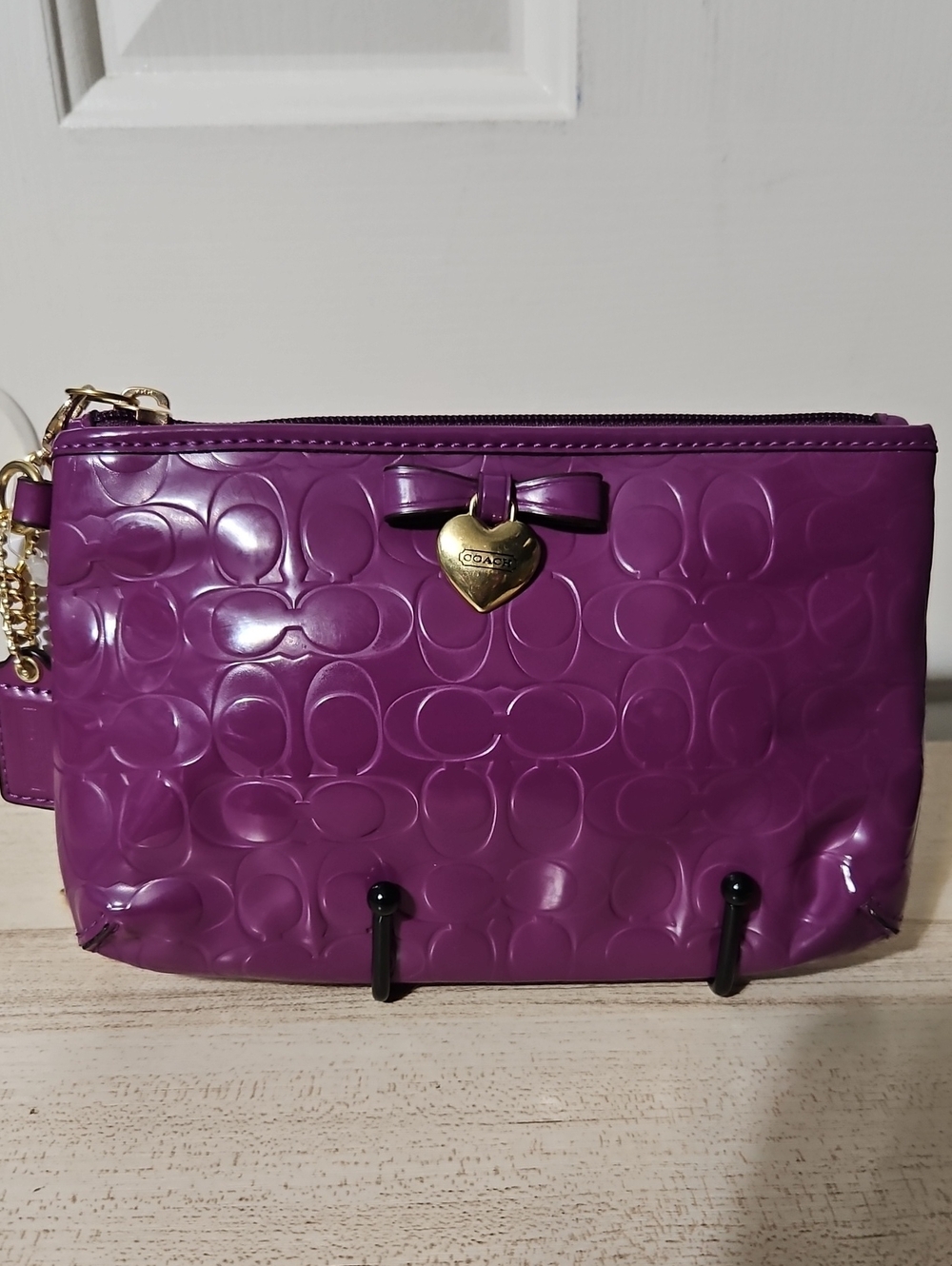 Coach NWT Patent Signature Wristlet in Vibrant Purple with Gold Heart Charm
